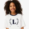 Bomullst-shirt med kontrastmärke Bomullst-shirt med kontrastmärke