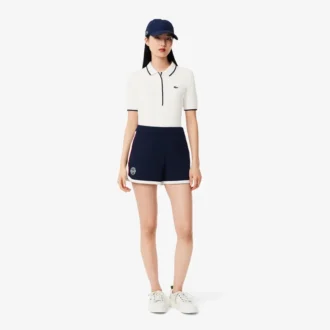 Dam-pikétröja i regular fit med termoreglerande tennis-mönster
