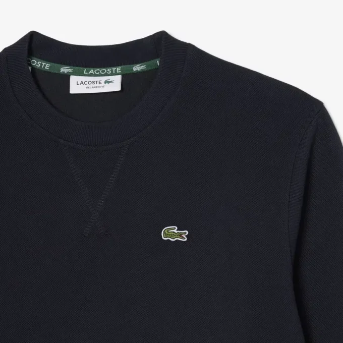 Dam-Sweatshirt i avslappnad passform med rund hals Dam-Sweatshirt i avslappnad passform med rund hals