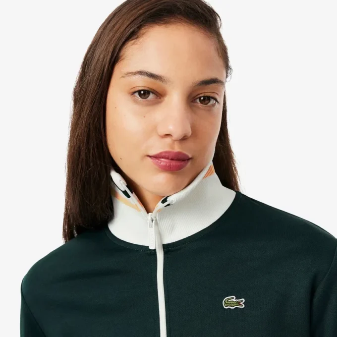 Dam-Sweatshirt med dragkedja och randiga detaljer Dam-Sweatshirt med dragkedja och randiga detaljer