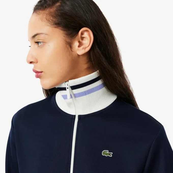 Dam-Sweatshirt med dragkedja och randiga detaljer Dam-Sweatshirt med dragkedja och randiga detaljer