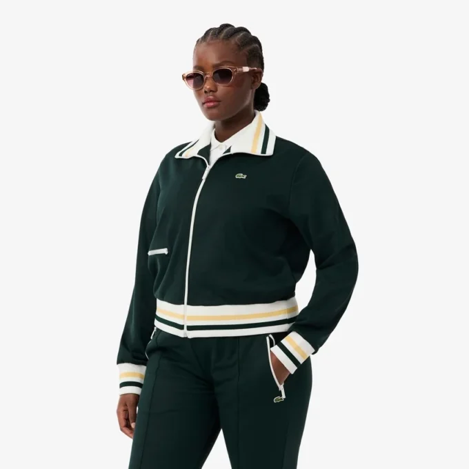 Dam-Sweatshirt med dragkedja och randiga detaljer Dam-Sweatshirt med dragkedja och randiga detaljer