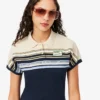 Dam, tillverkad i Frankrike, slim fit, randig pikétröja