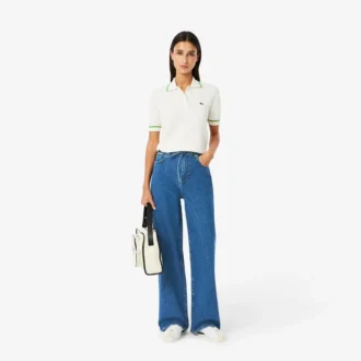 Dambyxor i denim med vid ben Dambyxor i denim med vid ben
