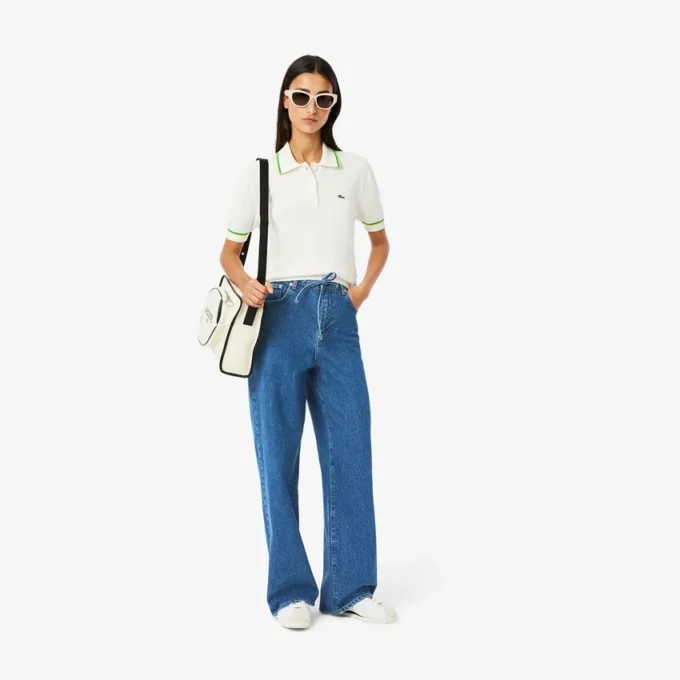 Dambyxor i denim med vid ben Dambyxor i denim med vid ben