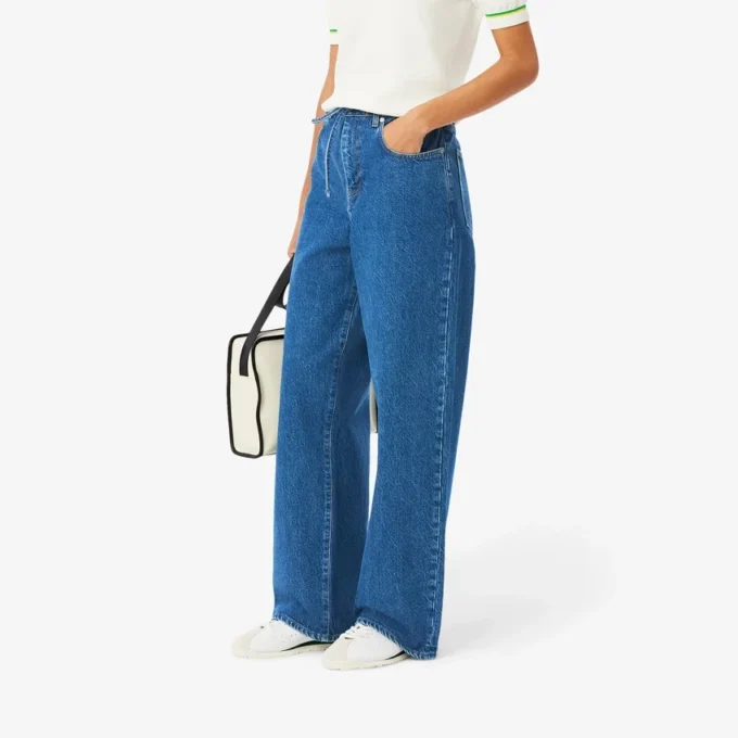 Dambyxor i denim med vid ben Dambyxor i denim med vid ben