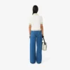 Dambyxor i denim med vid ben Dambyxor i denim med vid ben