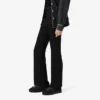 Dambyxor med hög midja och utsvängda ben Dambyxor med hög midja och utsvängda ben