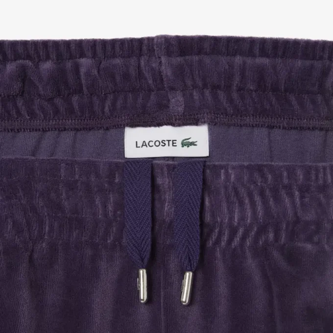 Damtröja i velour med kontrastdetaljer Damtröja i velour med kontrastdetaljer