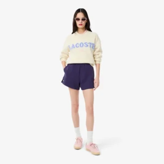 Dubbelvända piqueshorts för dam