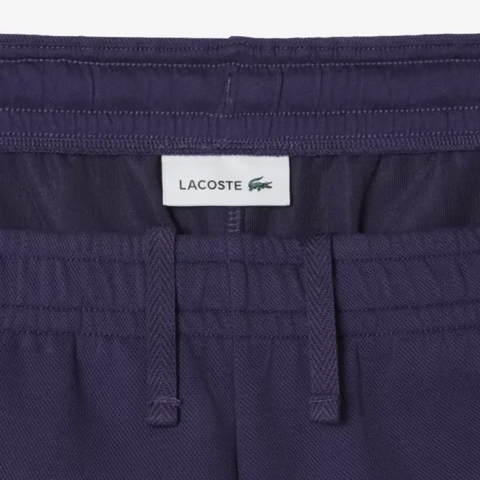 Dubbelvända piqueshorts för dam Dubbelvända piqueshorts för dam