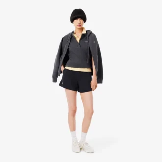 Dubbelvävda piqueshorts för dam