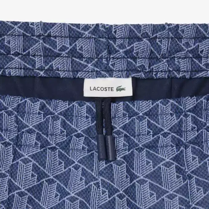 Flared Monogram-joggingbyxor för dam Flared Monogram-joggingbyxor för dam
