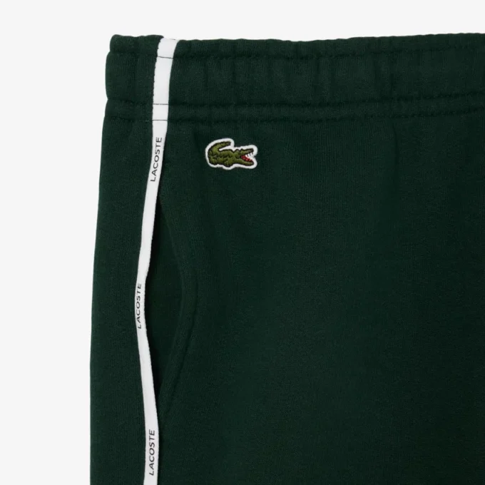 Fleece-joggingbyxor med randiga detaljer för pojkar Fleece-joggingbyxor med randiga detaljer för pojkar