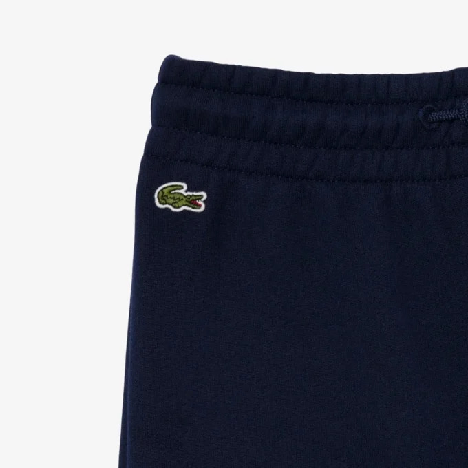 Fleece-joggingbyxor med utsvängda ben för flickor Fleece-joggingbyxor med utsvängda ben för flickor