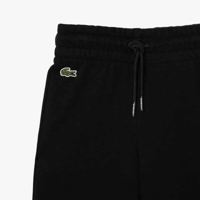 Fleece-joggingbyxor med utsvängda ben för tjejer Fleece-joggingbyxor med utsvängda ben för tjejer