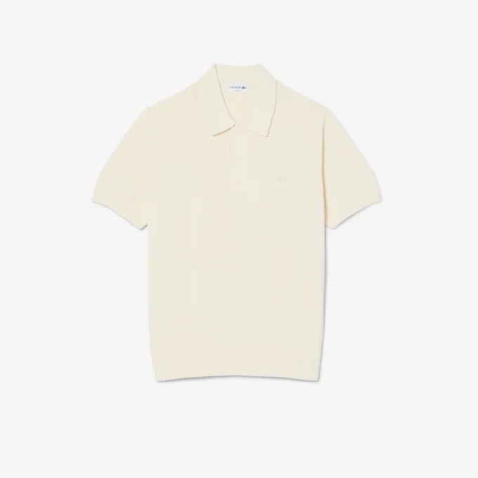 Flytande ribbad stickad tröja med polokrage Flytande ribbad stickad tröja med polokrage