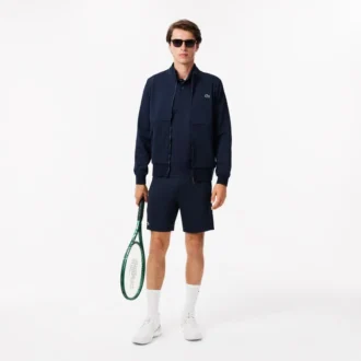 Herr-tennispolo i jersey med regular fit och Ultra Dry-teknik