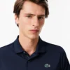 Herr-tennispolo i jersey med regular fit och Ultra Dry-teknik Herr-tennispolo i jersey med regular fit och Ultra Dry-teknik