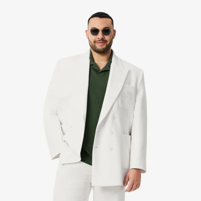 Herrblazer med dubbelknäppning och broderad Heritage-logotyp Herrblazer med dubbelknäppning och broderad Heritage-logotyp