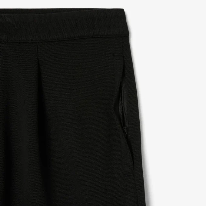 Herrbyxor i lös passform med plissering i piqué Herrbyxor i lös passform med plissering i piqué
