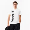 Herrpikétröja i normal passform med Lacoste Movement-tryck Herrpikétröja i normal passform med Lacoste Movement-tryck