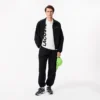 Herrpikétröja i normal passform med Lacoste Movement-tryck Herrpikétröja i normal passform med Lacoste Movement-tryck