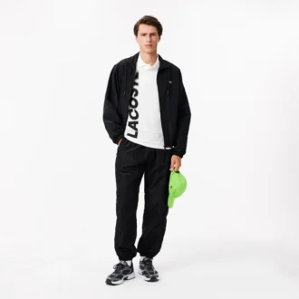 Herrpikétröja i normal passform med Lacoste Movement-tryck