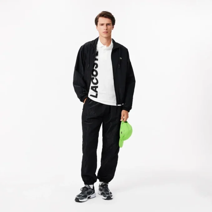 Herrpikétröja i normal passform med Lacoste Movement-tryck Herrpikétröja i normal passform med Lacoste Movement-tryck