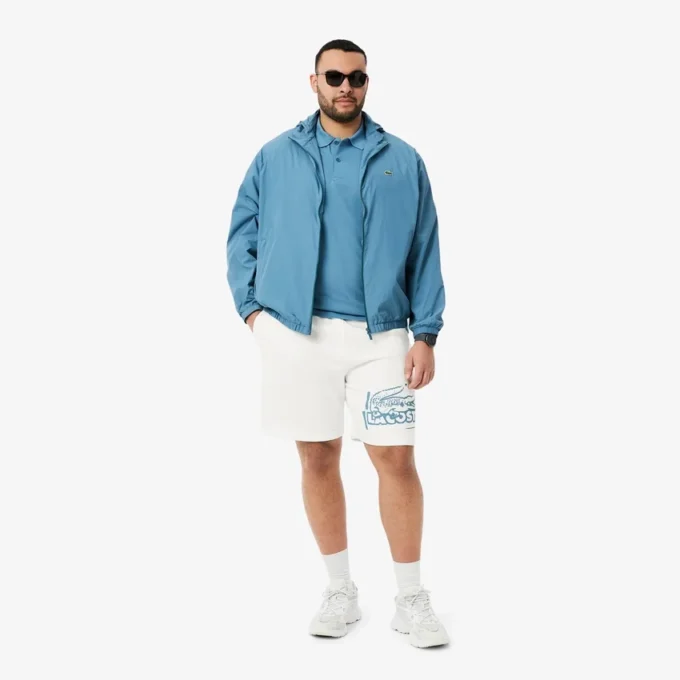 Herrshorts i bomullsfleece med grafiskt tryck Herrshorts i bomullsfleece med grafiskt tryck