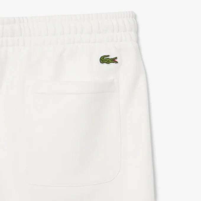 Herrshorts i bomullsfleece med grafiskt tryck Herrshorts i bomullsfleece med grafiskt tryck
