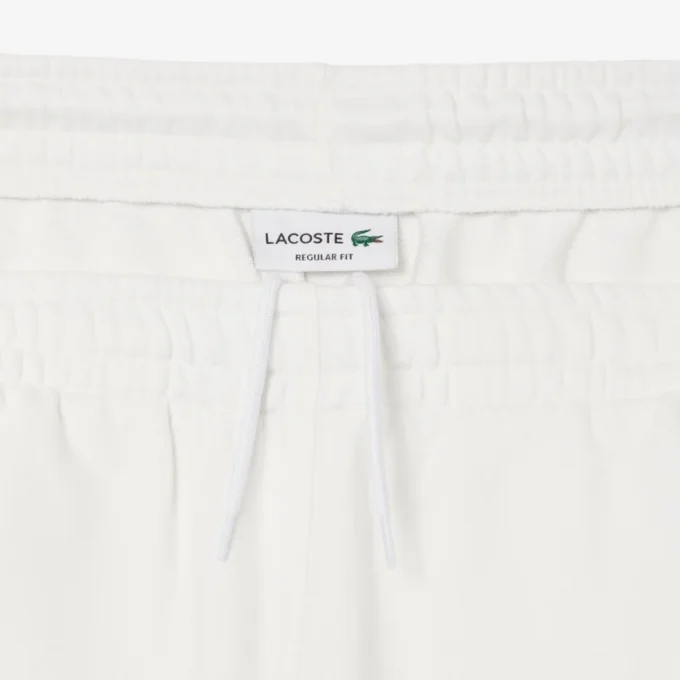Herrshorts i bomullsfleece med grafiskt tryck Herrshorts i bomullsfleece med grafiskt tryck