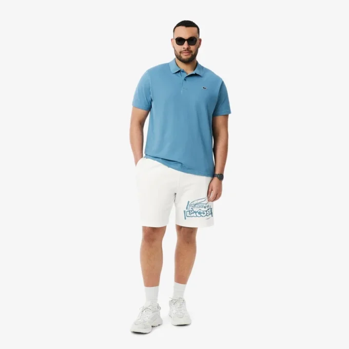Herrshorts i bomullsfleece med grafiskt tryck Herrshorts i bomullsfleece med grafiskt tryck