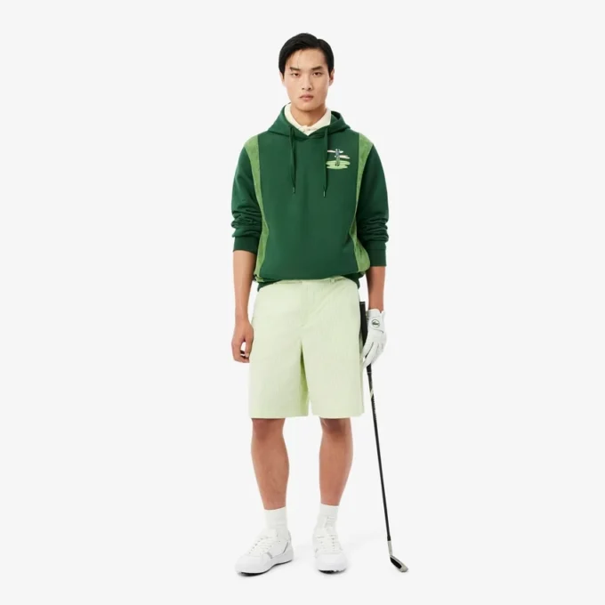 Huvtröja med golfmotiv
