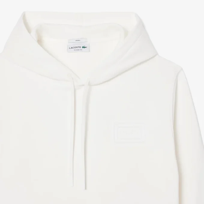 Huvtröja med präglad logotyp