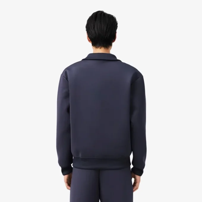 Jacka med hög krage och broderad logotyp Jacka med hög krage och broderad logotyp