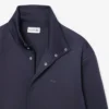 Jacka med hög krage och broderad logotyp Jacka med hög krage och broderad logotyp