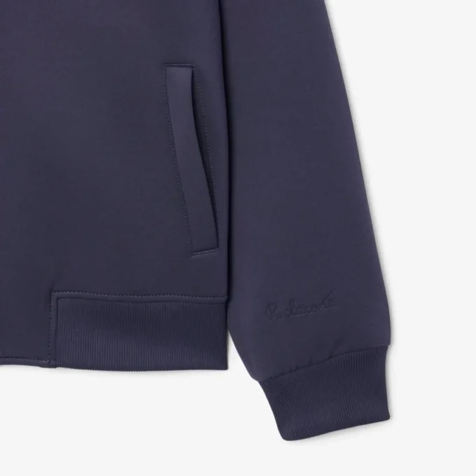 Jacka med hög krage och broderad logotyp Jacka med hög krage och broderad logotyp