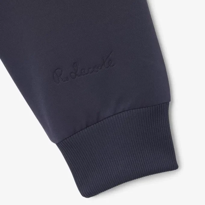 Jacka med hög krage och broderad logotyp Jacka med hög krage och broderad logotyp