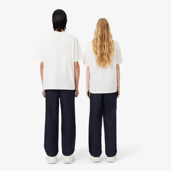 Joggingbyxor i denim från catwalken Joggingbyxor i denim från catwalken
