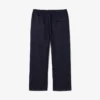Joggingbyxor i denim från catwalken Joggingbyxor i denim från catwalken