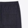 Joggingbyxor i denim från catwalken Joggingbyxor i denim från catwalken