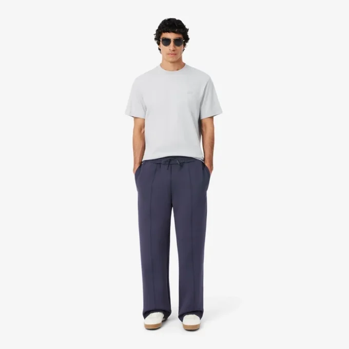 Joggingbyxor med broderat mönster i lös passform Joggingbyxor med broderat mönster i lös passform