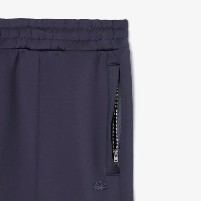 Joggingbyxor med broderat mönster i lös passform Joggingbyxor med broderat mönster i lös passform