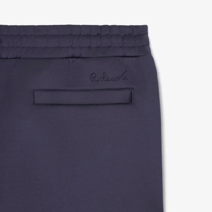 Joggingbyxor med broderat mönster i lös passform Joggingbyxor med broderat mönster i lös passform