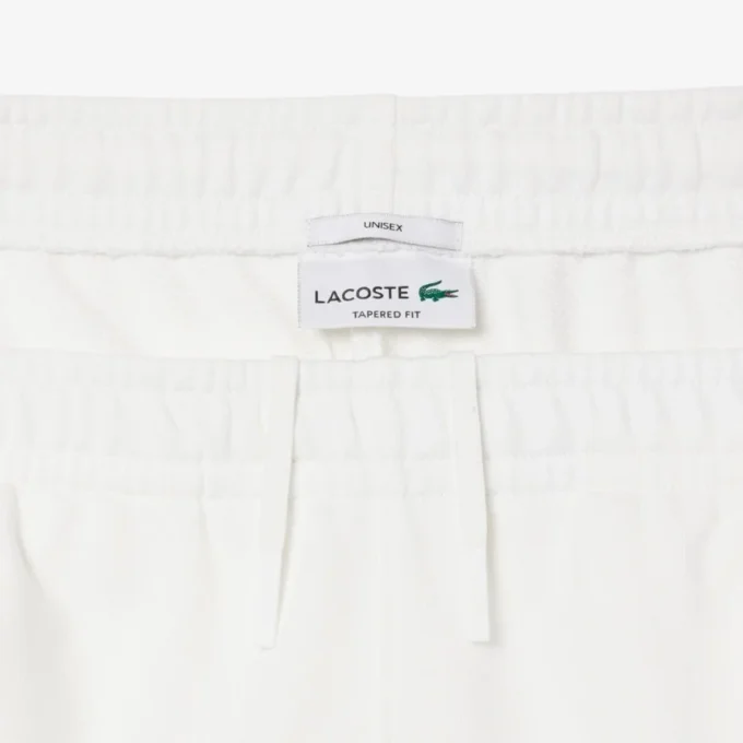 Joggingbyxor med präglad logotyp Joggingbyxor med präglad logotyp