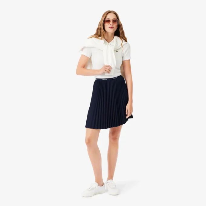Kort plisserad kjol för dam Kort plisserad kjol för dam