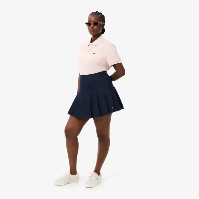 Kort plisserad kjol i stretchbomull för dam Kort plisserad kjol i stretchbomull för dam