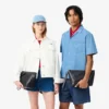 Lacoste Club-clutch i kornigt läder