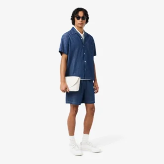Liten Club Lacoste-messengerväska